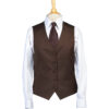 Mannequin torso in a white dress shirt, brown waistcoat, and striped brown tie on a dress form.