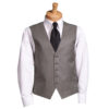 Mannequin wearing a white dress shirt with a black-and-white diamond-patterned waistcoat and a black tie.